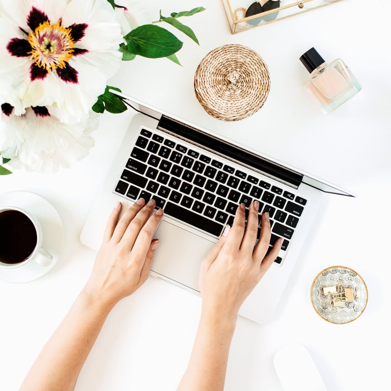 Woman Typing on Desk at Home Office